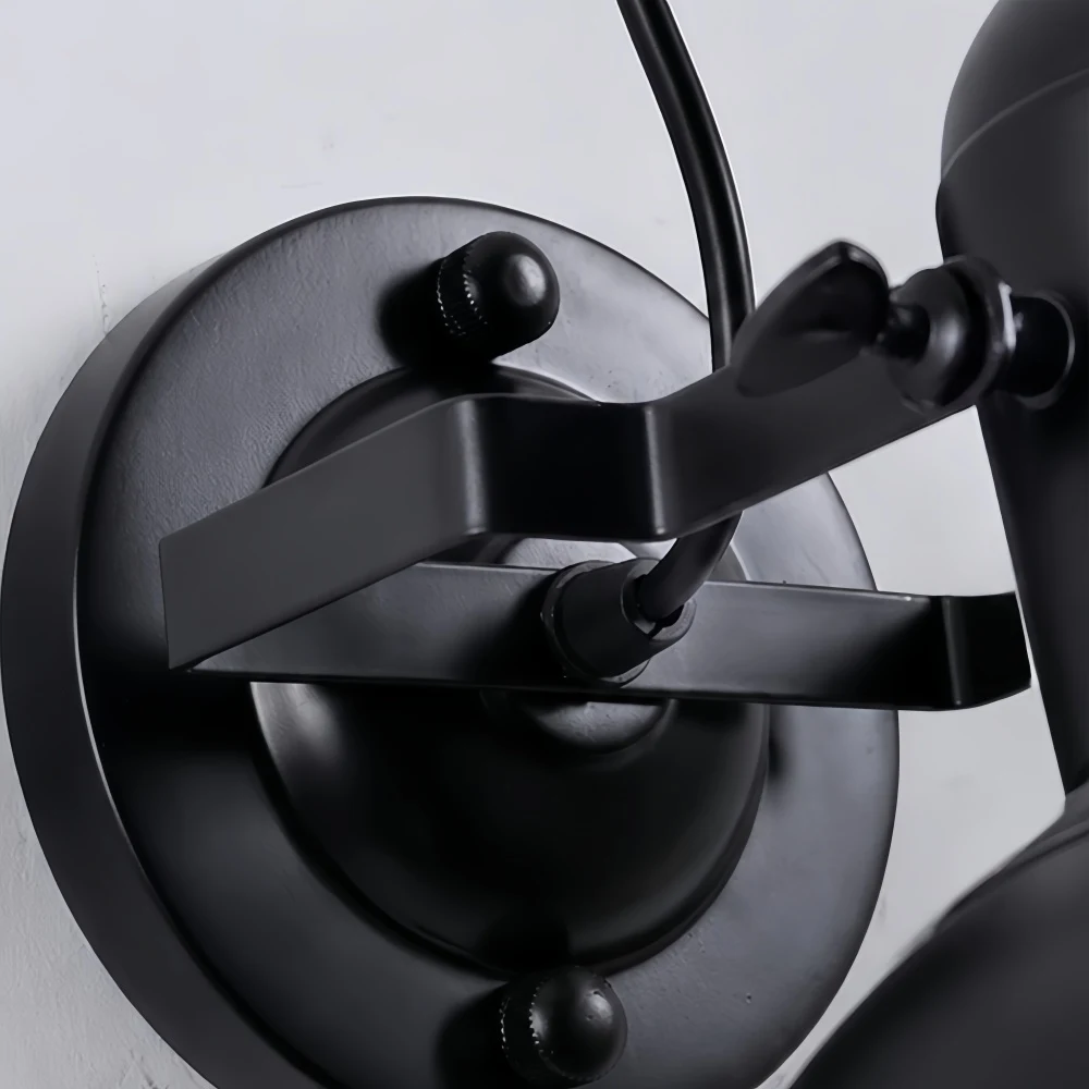 Circular wall plate and short articulating arm close-up