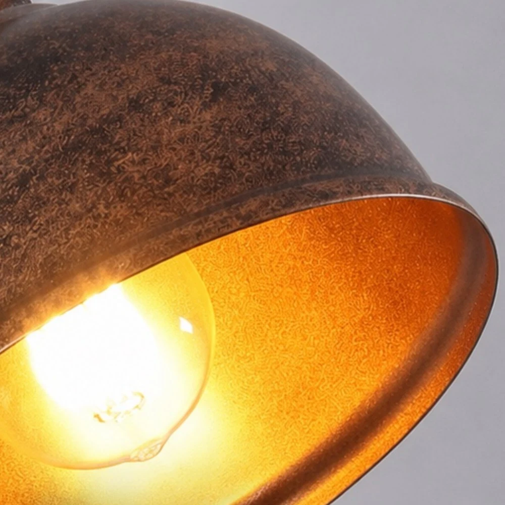 Metal dome shade and industrial finish close-up