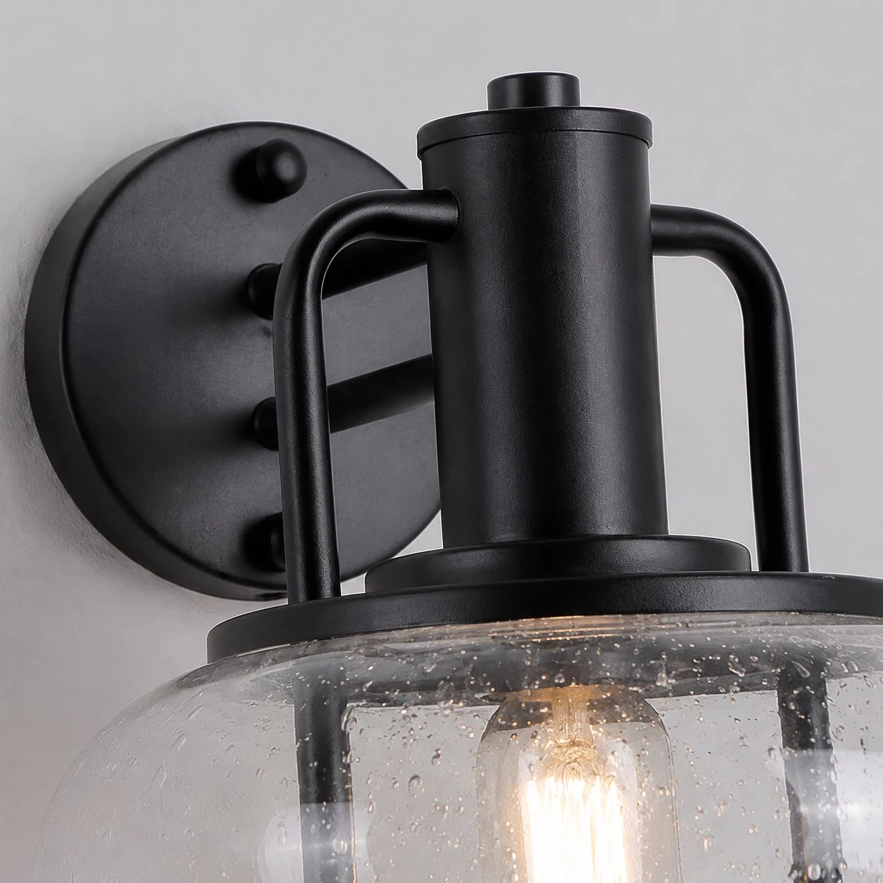 Protective metal cage around the glass shade