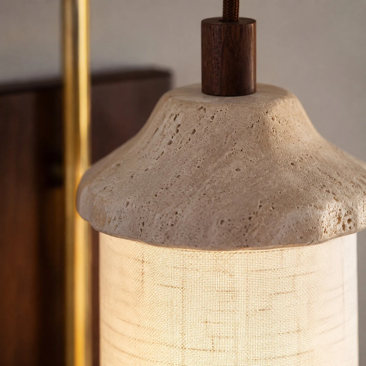 Travertine stone and fabric shade close detail