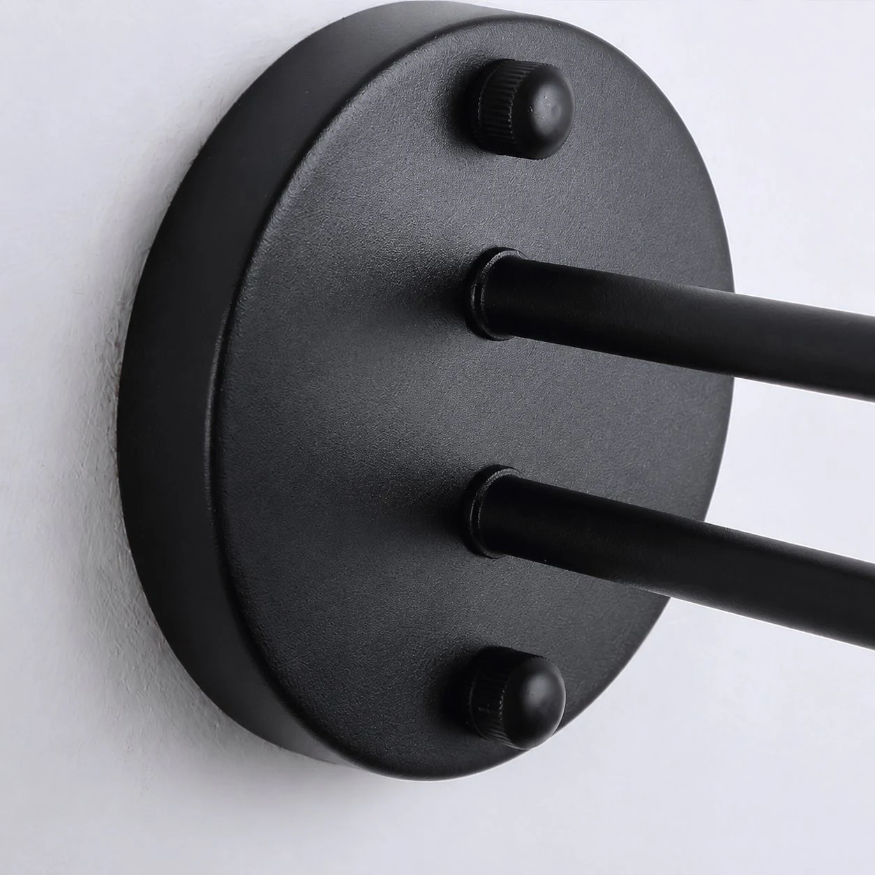 Round backplate and twin support arms