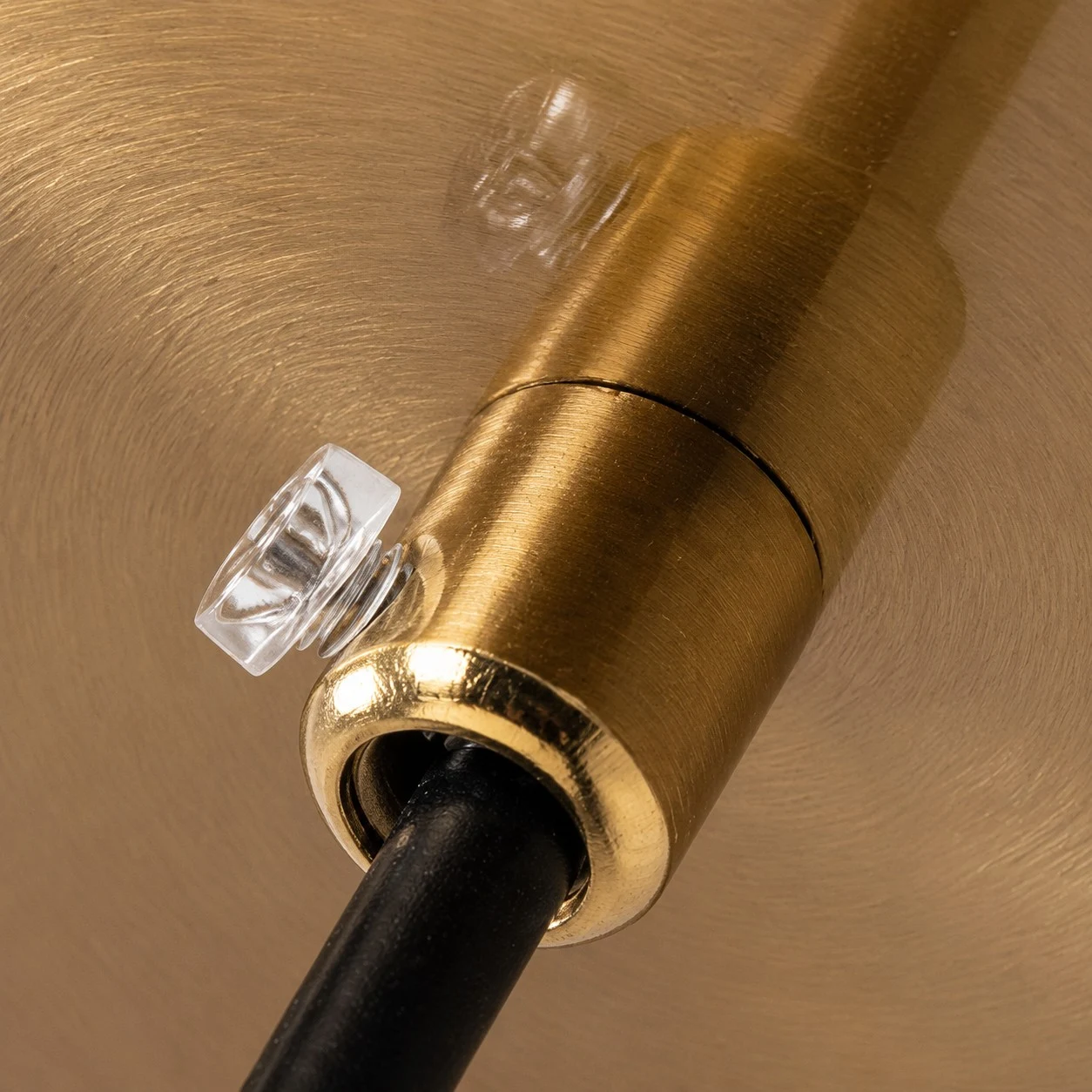 Pendant cord and brass canopy detail