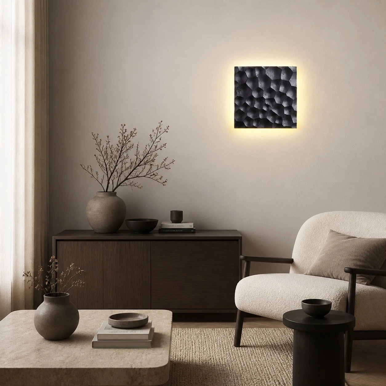 Square travertine wall sconce used as bedside ambient lighting