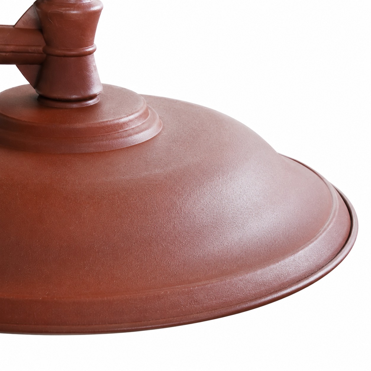 Raised finial and gooseneck arched support detail