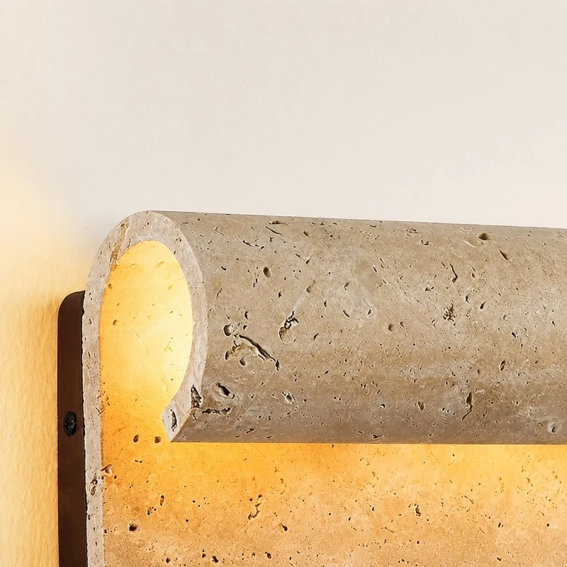 Rounded travertine wall light detail