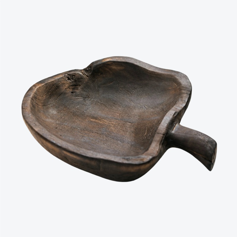 Apple-shaped wooden serving board on white background