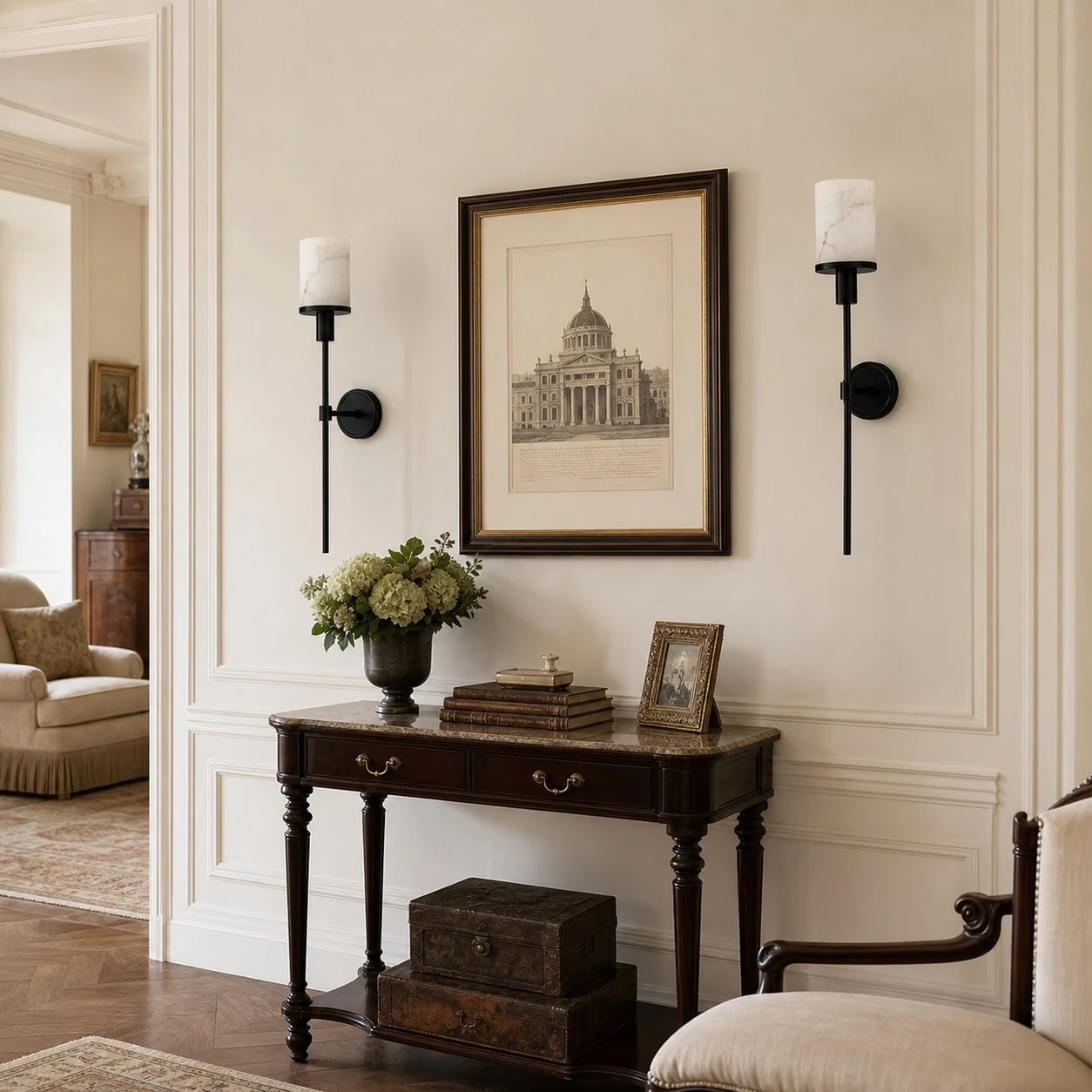 Marble brass wall sconces above a console