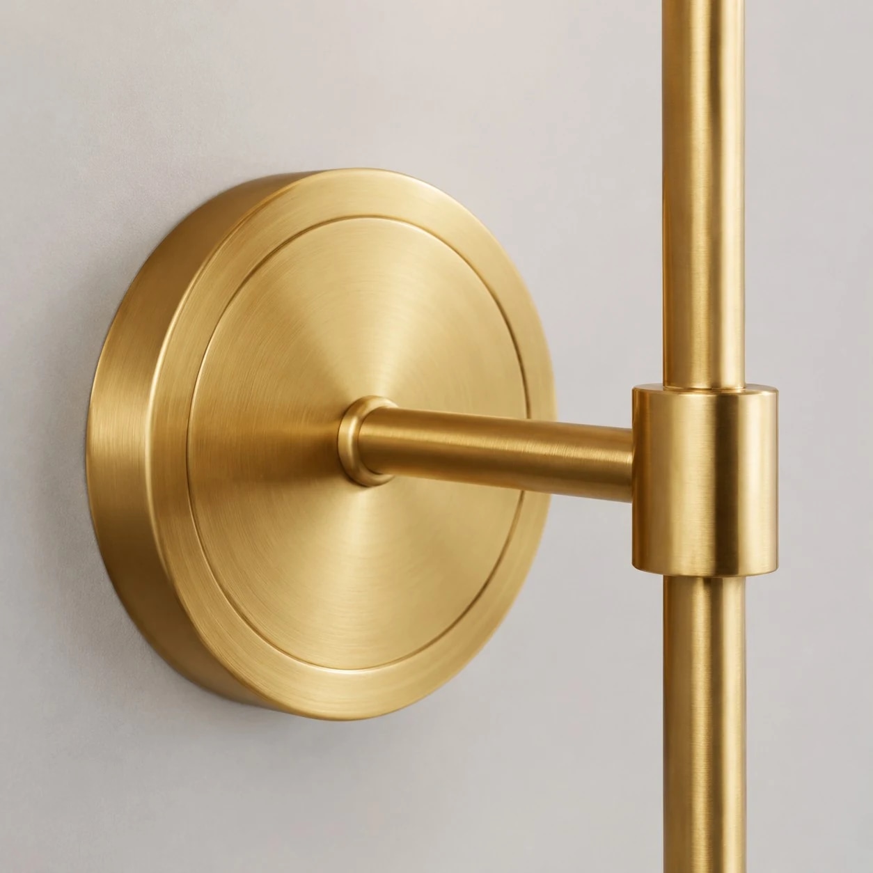 Brass wall plate and arm detail