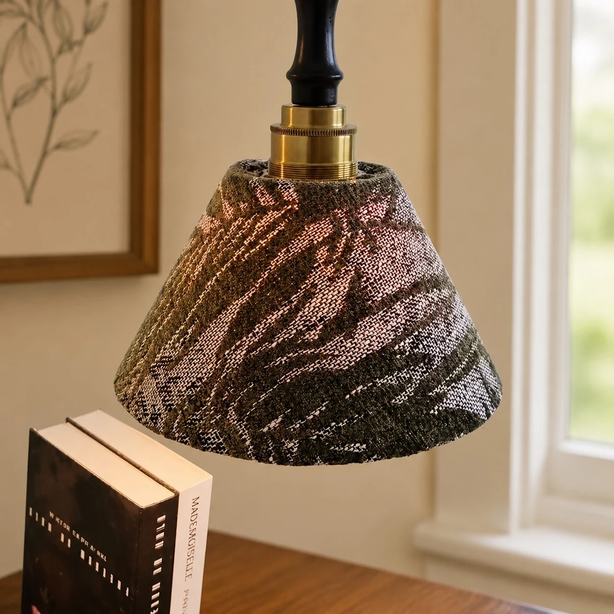 Close-up fabric shade texture and brass/wood hardware