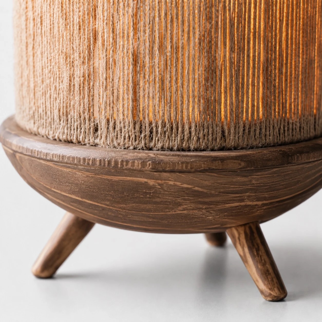 Close-up of corded shade and wood base