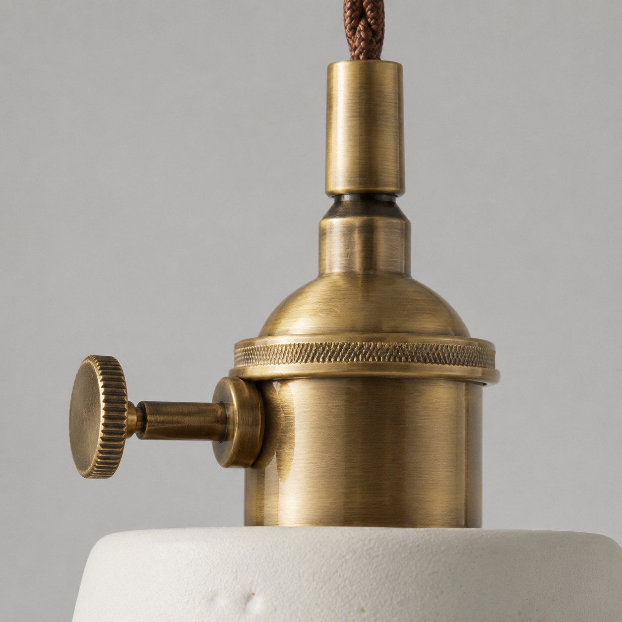 Antique brass-tone socket and cord detail