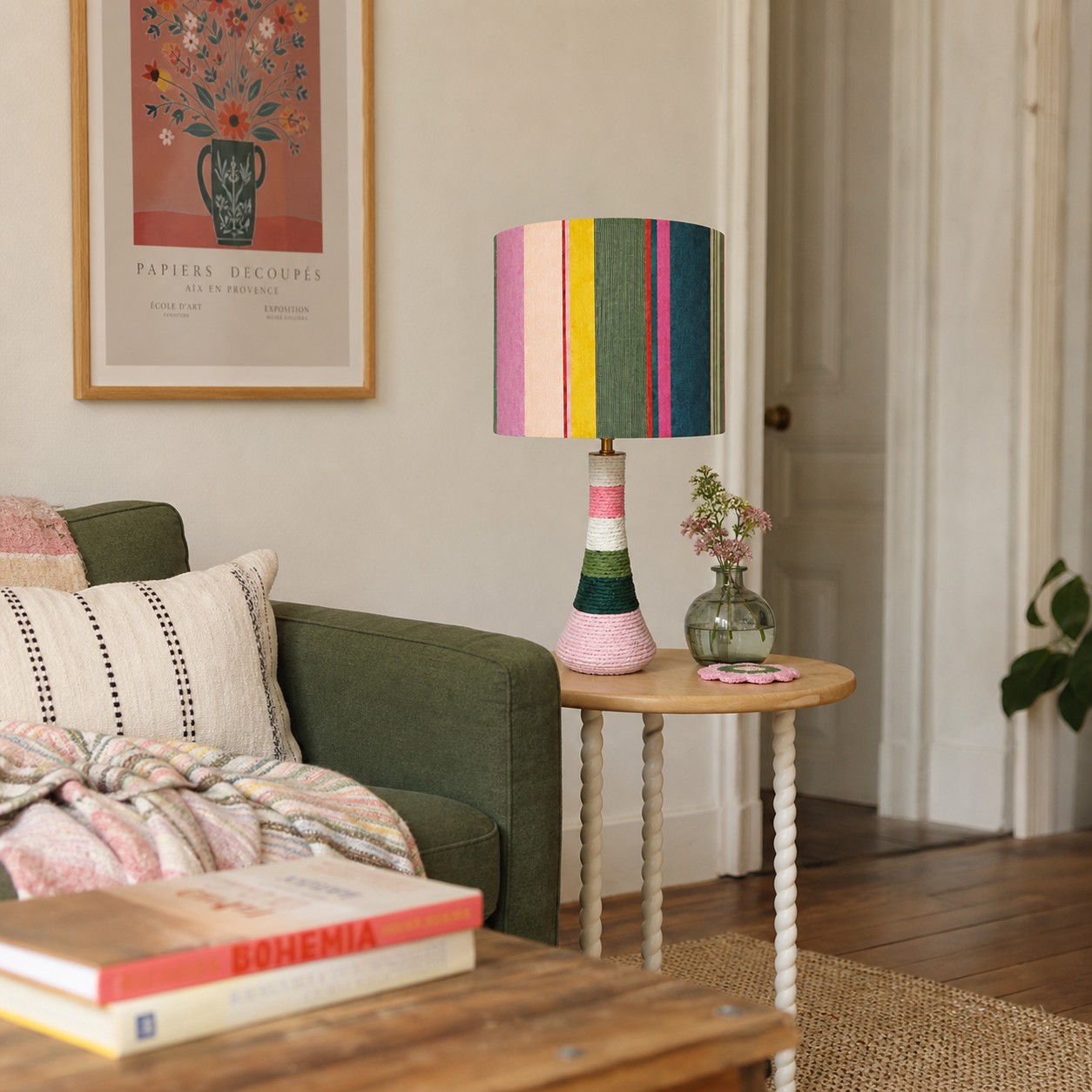 Colorful striped table lamp on side table in a living room setting
