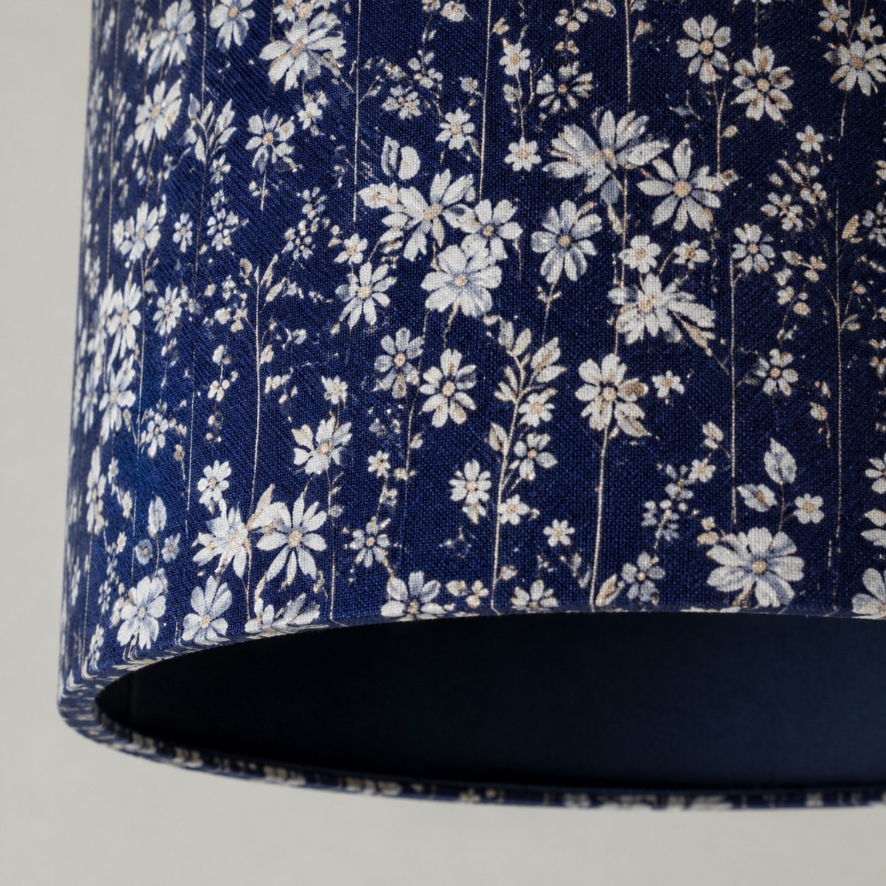 Blue floral fabric shade edge and lower rim detail