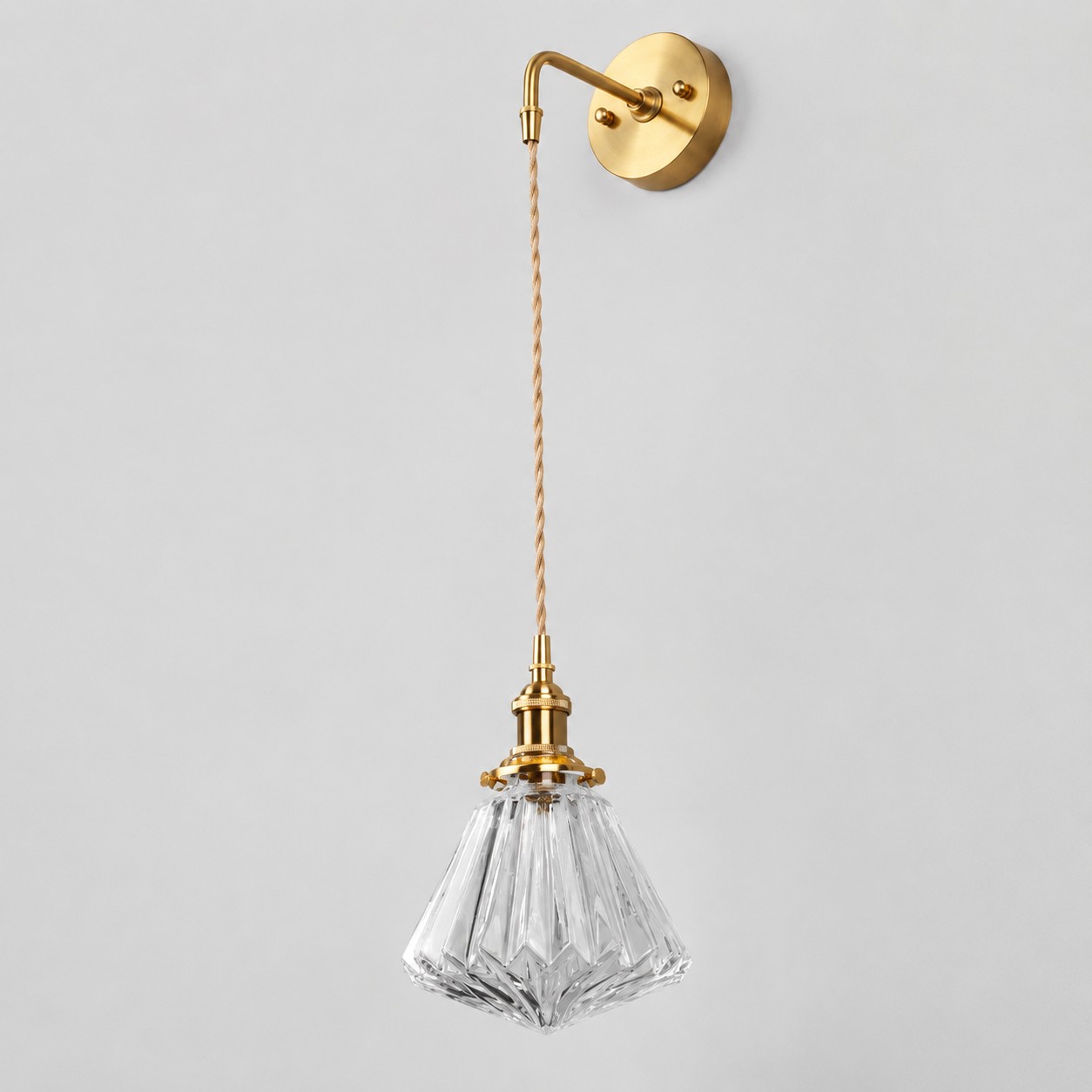 Clear glass wall light with brass arm, 318W shade 17 cm diameter and 15 cm high