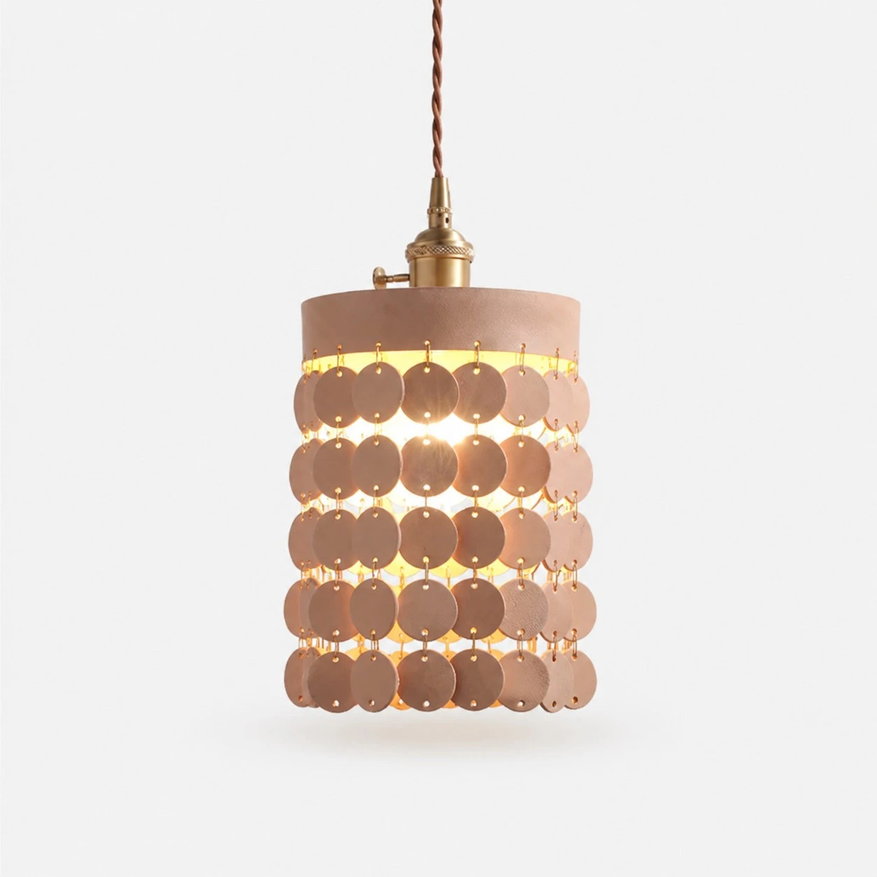 Natural leather pendant light on a white background