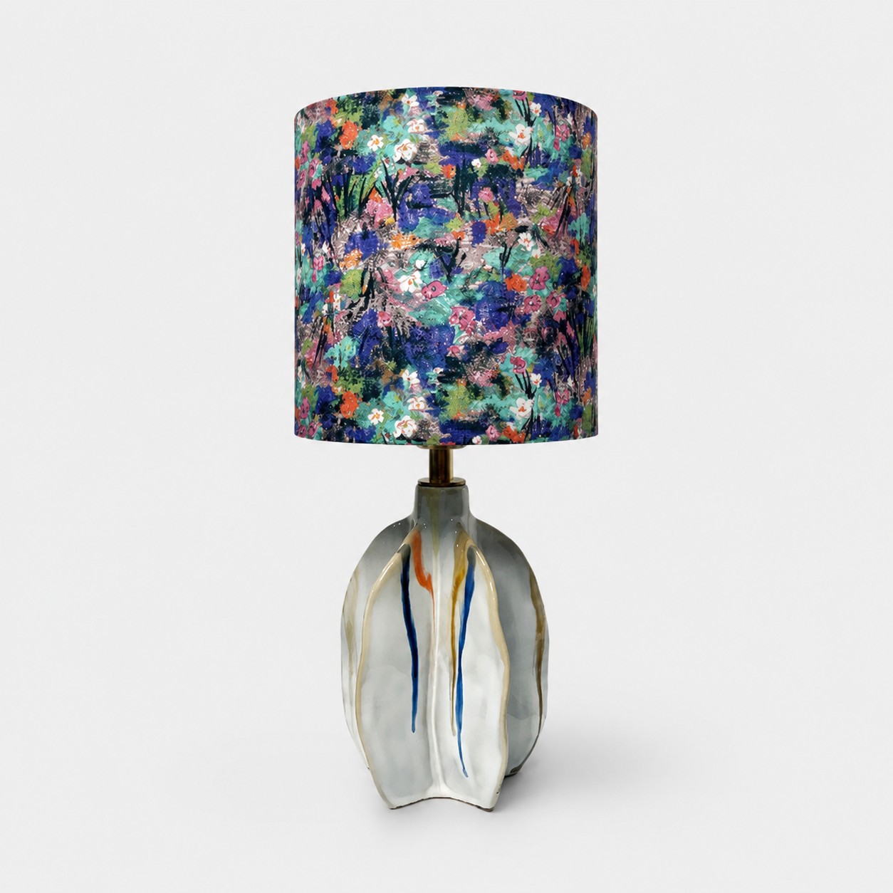 Handmade ceramic table lamp with floral print fabric shade