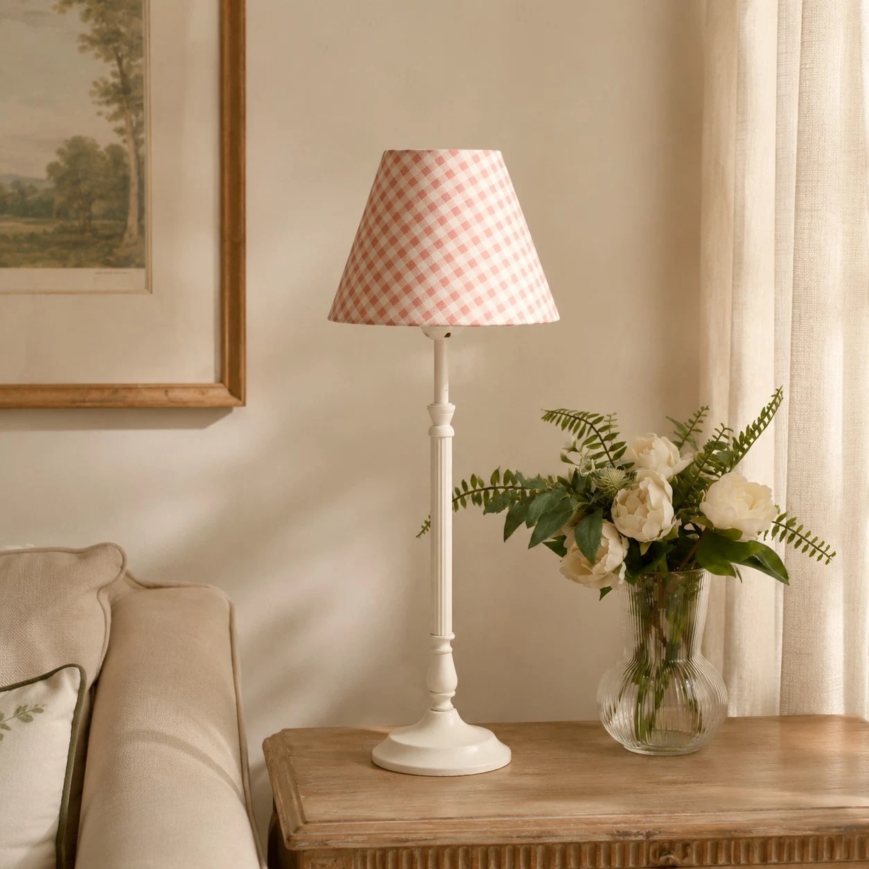 Pink gingham French country table lamp in a warm room
